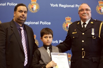 Six-year-old Arjunpal Khattra from Markham received an award of bravery for helping his father when he was trapped in a 25-foot-deep well