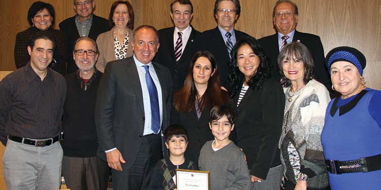 Mayor Maurizio Bevilacqua and members of council with Ward 4 Civic Hero Award recipient Lisa Cantkier and family