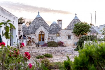 Trulli — distinct and ancient round stone huts with conical roofs — abound at Trullo Terra Dolce, as well as at Casa Romigi in Valle d’Itria