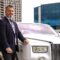 Rob Iafrate of A Celebrity Limousine Service standing beside a Limousine.