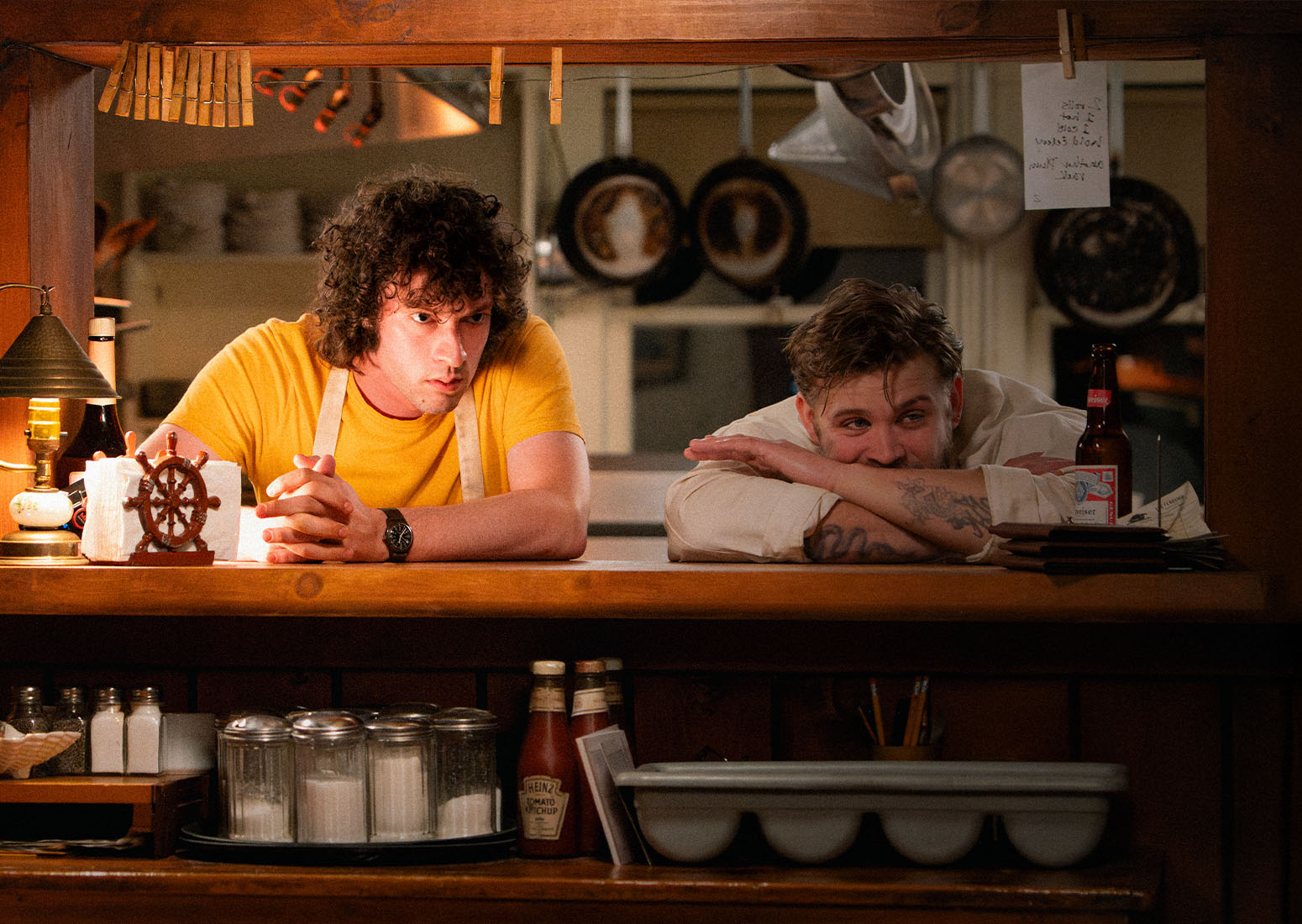Tony_cover sotry1 Tony Bourdain and Sal, his fellow restaurant worker, (played by Dominic Sessa and Leo Woodall, respectively), before Bourdain became an icon for generations to follow. | Photo By Seacia Pavao